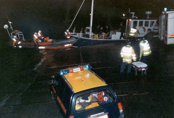 Portaferry lifeboat crew working with coastguard and ambulance personnel